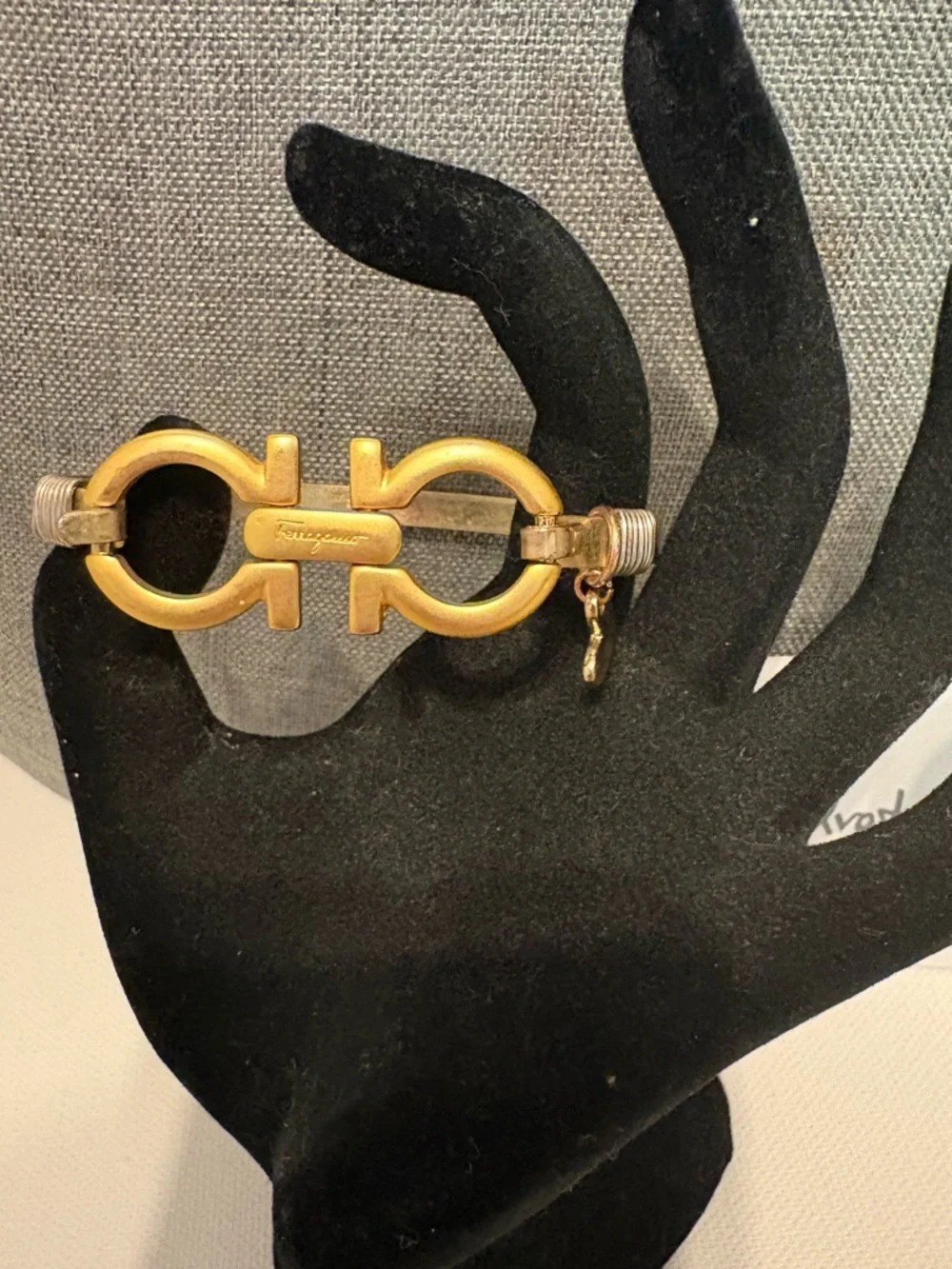 Authentic Salvatore Ferragamo charm set on unbranded bangle bracelet